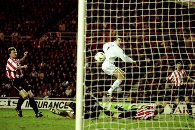 Michael Bridges scores past Sunderland goalkeeper Thomas Sorensen at the Stadium of Light in January 2000. Leeds won 2-1 to stay top of the Premiership.