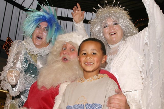 Maddi Bojang helps celebrate the switching on of Christmas lights with Jack Frost, the Snow Queen and Father Christmas at the Ridings.
