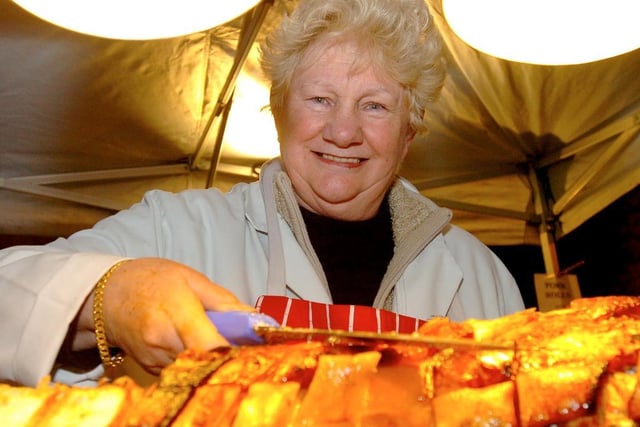 Marina Linley carving the hog roast.