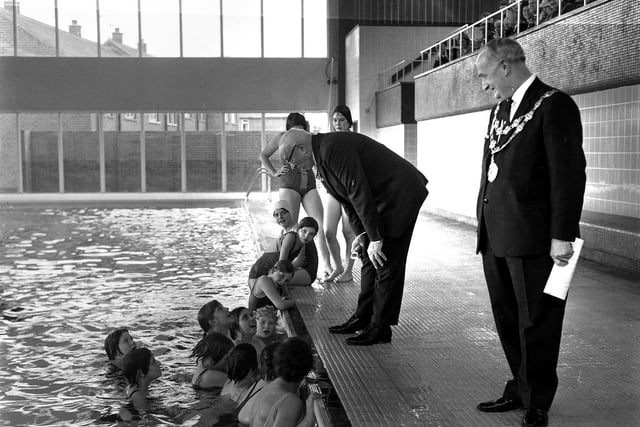 RETRO 1970 - Lord Rhodes Lieutenant of Lancashire chats to swimmers at the official opening of The Urban District Council of Hindley new swimming pool on 18th March 1970.