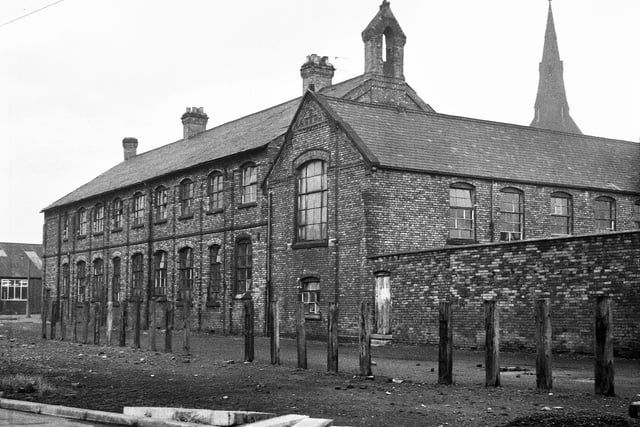 St. Joseph's RC School located between Caroline Street and Hodson Street just before it closed down on Wednesday 22nd December 1971.  The school was erected in 1874 and after closure pupils were relocated to St. Jude's in Worsley Mesnes.  To the right is the spire of St.Thomas's Church also on Caroline Street.