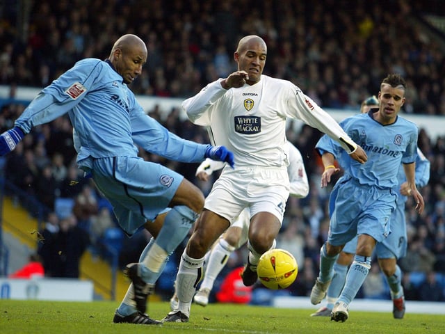 Clarke Carlisle in the thick of the action.