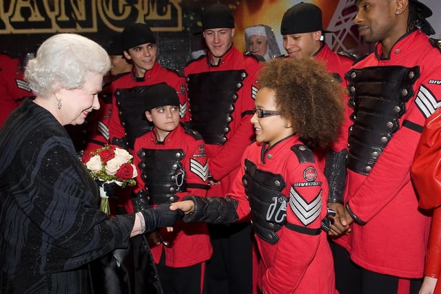 The Queen meets members of the dance group Diversity in 2009