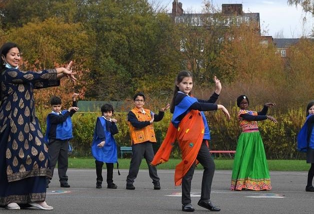 Pupils at St Stephens School, South Meadow Lane, Preston, learning about Diwali with Abhi Kodanda from Gujarat Hindu Society