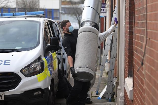 Photo Neil Cross; Police officers at the scene of a drugs raid in Christchurch Street, Preston