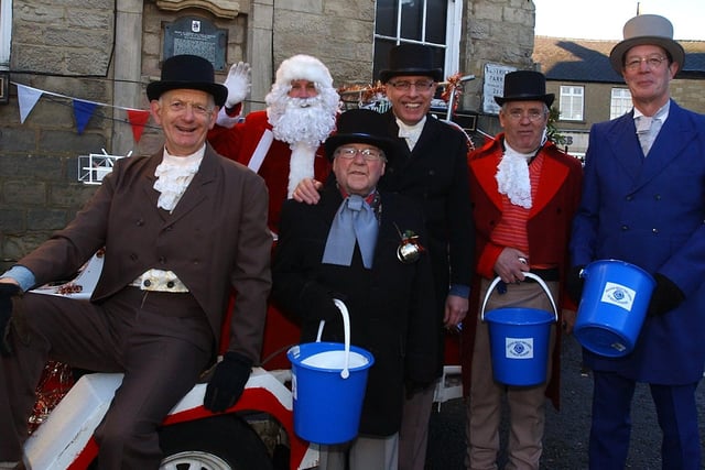Organisers David Shaw, Santa, Colin Gaden, Michael Earle, John Leetch and Stuart Arnold at the Wetherby Lions Dickension Market in 2006.