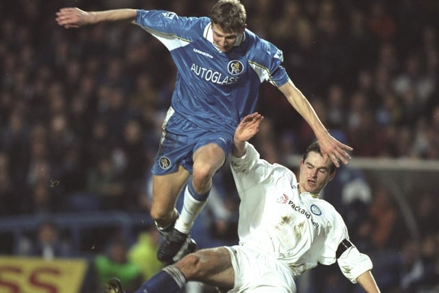 Chelsea striker Tore Andre Flo skips over David Wetherall. He had a goal disallowed during the game.