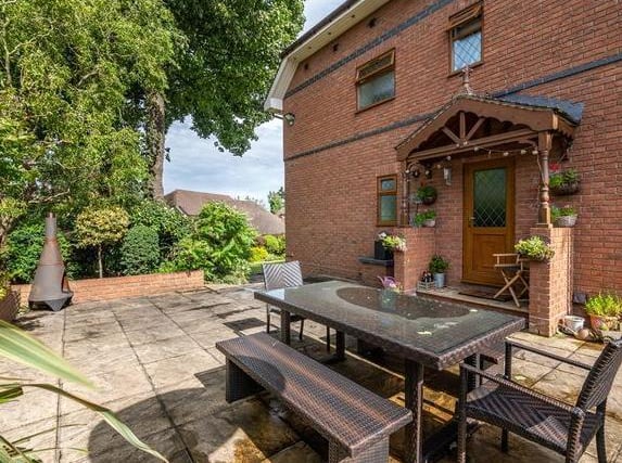 The property has a gated private driveway and double garage as well two [patio areas and a low maintenance front garden. It is on the market for £699,000 with Dacre Son & Hartley.