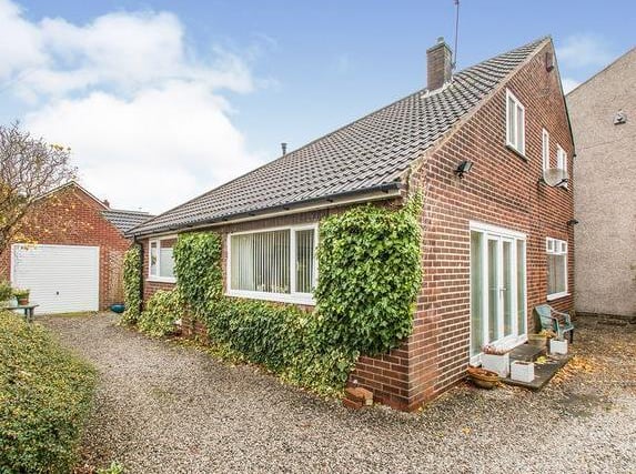 This deceptive bungalow in Street Lane in Gildersome boasts six bedrooms making it perfect for a large family. It has a large kitchen diner and is close to good local schools.