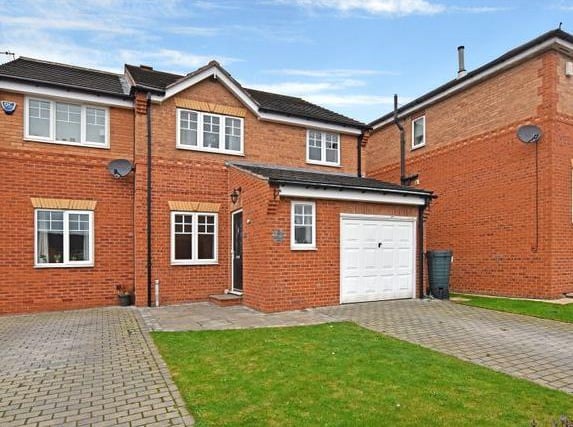 The spacious detached home in Stonechat Rise is perfect for a large family. It has five bedrooms, included a master with fitted wardrobes and an en-suite bathroom.