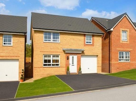 This modern new build home is part of the St Andrew's Place development on Bruntcliffe Road, developed by Barratt Homes. The detached house has four bedrooms, two bathrooms and two reception rooms.