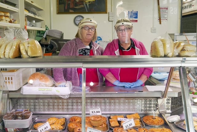 Traders open in Castleford Market during lockdown.Barbara Williams-Harding and Carol Hall. Picture Scott Merrylees
