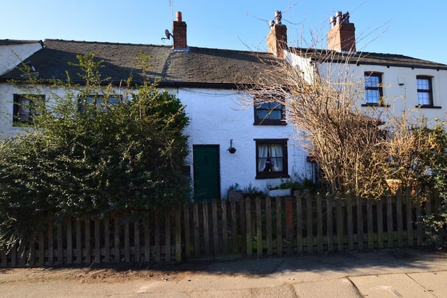 This Grade II listed cottage in Old York Road was built around 1604. The two-bedroom home is complete with exposed beams and a feature fireplace with stone hearth.