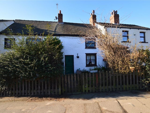 This Grade II listed cottage in Old York Road was built around 1604. The two-bedroom home is complete with exposed beams and a feature fireplace with stone hearth.