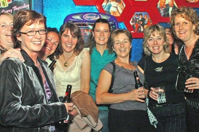 Helen, Debie, Liza, Christie, Michelle, Dawn, Jan and Jane enjoy a night out in 2006.