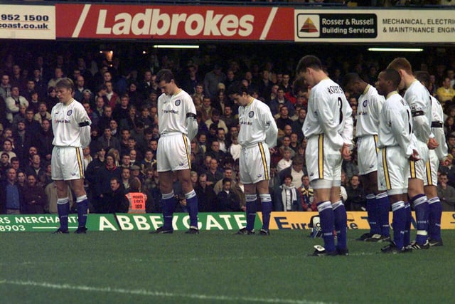 The players observe a silence for the late great Leeds United legend Billy Bremner before kick-off.