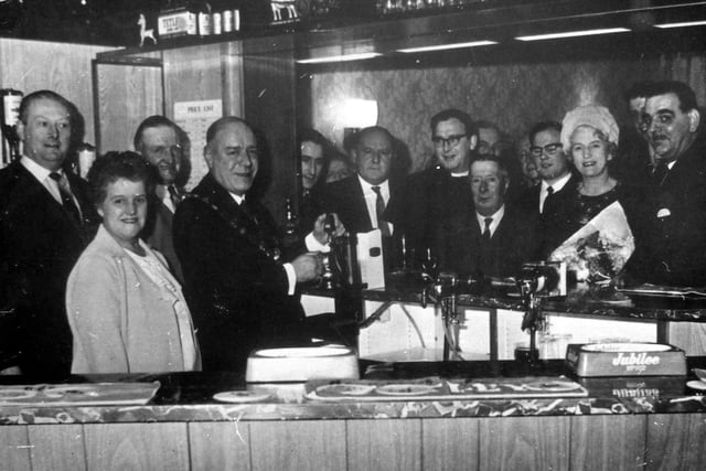 Circa 1968/69. Arthur Rhodes Parker, Mayor of Morley, pulls a pint at an unidentified Morley public house. Alderman Parker was mayor between May 1968 and May 1969.