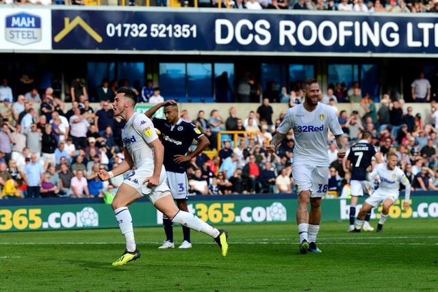 Harrison races away to celebrate his first goal for Leeds in the 1-1 draw at Millwall as Pontus Jansson smiles looking on. Harrison played in a very central attacking role. Picture by James Hardisty.