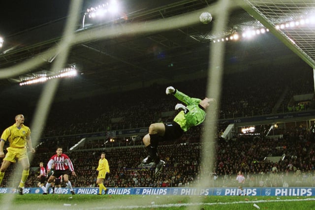 Nigel Martyn tips over the bar during the UEFA Cup fourth round first leg clash 
 against PSV Eindhoven in Holland in February 2002. The game ended goalless.