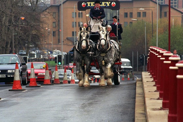 The Tetley dray horses Prince (left) and Charles make their way over the newly -widened Crown Point Bridge which was officially opened by Coun Linda Middleton.