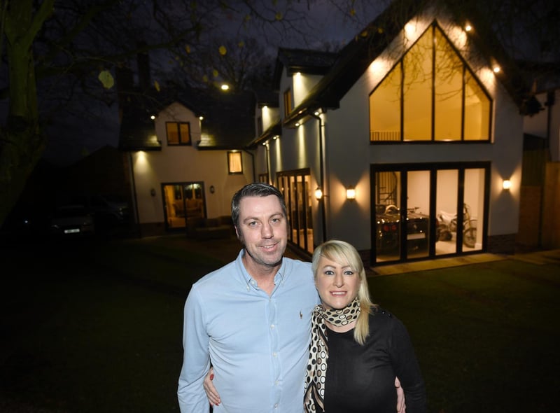 Wiganer Jennifer Matthews and husband David are raffling off their bespoke five-bedroom family home, Bramble Lodge, Chorley Road, Blackrod, along with a Ferrari, which is parked in the kitchen, for £2 a ticket.