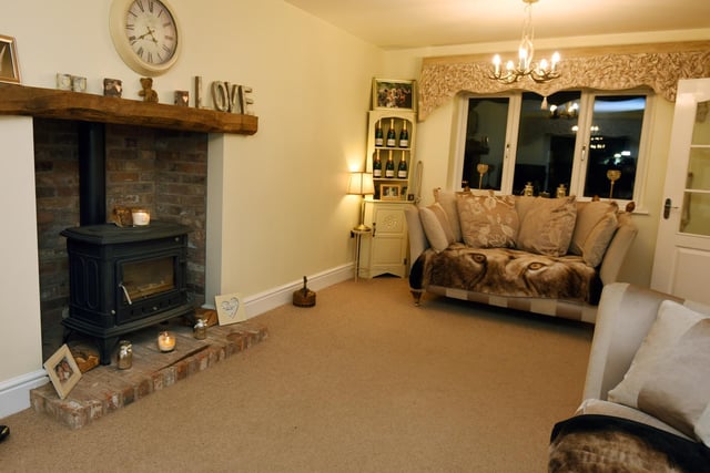 Living room with log burner.