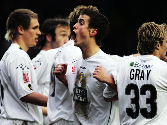 Danny Pugh organises a defensive wall during the game.