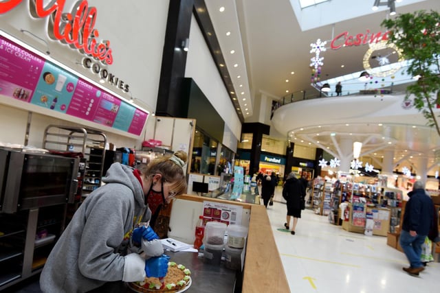 Staff are back to business as shoppers hit the streets at The Grand Arcade shopping centre, Wigan.