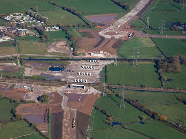 Rain over the summer caused some delays to earthworks and piling on the site, but plans are afoot to catch up (image: Costain)