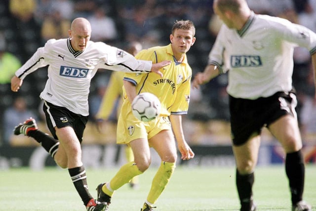 Eirik Bakke puts the ball through against Derby County's Seth Johnson during the FA Carling Premiership match at Pride Park in September 2000. The game finished 1-1.