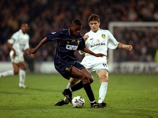 Eirik Bakke challenges Wimbledon's Carl Cort during the FA Carling Premiership match at Selhurst Park in November 1999. The Dons won 2-0.