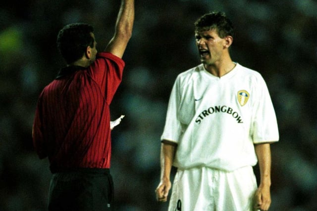 Eirik Bakke receives a red card from referee Costas Kapitanis during the Champions League third qualifying round first leg against  1860 Munich in August 2000. Leeds won 2-1.