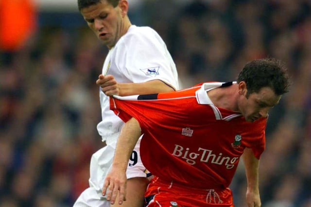 Eirik Bakke tugs on the shirt of Barnsley's Matthew Appleby dueing the FA Cup third round clash at Elland Road in January 2001. The Whites won 1-0 thanks to a goal from Mark Viduka.