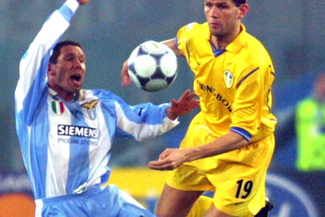 Lazio midfielder Diego Simone fights for the ball with Eirik Bakke during the Champions League clash at the Stadio Olimpico in December 2000.
