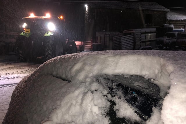 Several inches of snow quickly fell overnight, burying cars and coating country roads