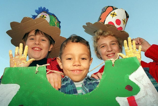 Cassie, Jonathan and Leanne show off their circus-style costumes for the 1995 Castleford Christmas lights procession, at Smawthorne Infants School, Castleford.