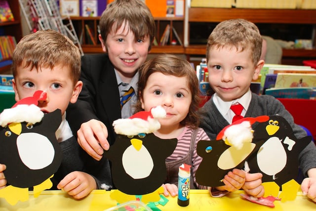 Michael, Patrick, Eimear and Anthony make their own Christmas decorations at South Elmsall library in December 2007.