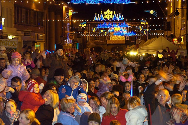 Crowds enjoy the Christmas Lights switch on in the Market Place at Pontefract, November 2007.
