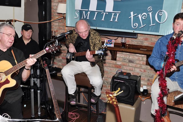 Jim, Jeff, Mike and Robin are The Lee Smith Trio, in Pickering in 2011.