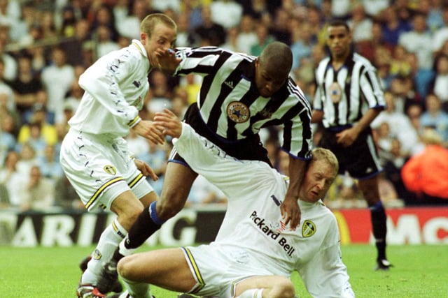 Newctasle United's Didier Domi battles with David Batty and Lee Bowyer.