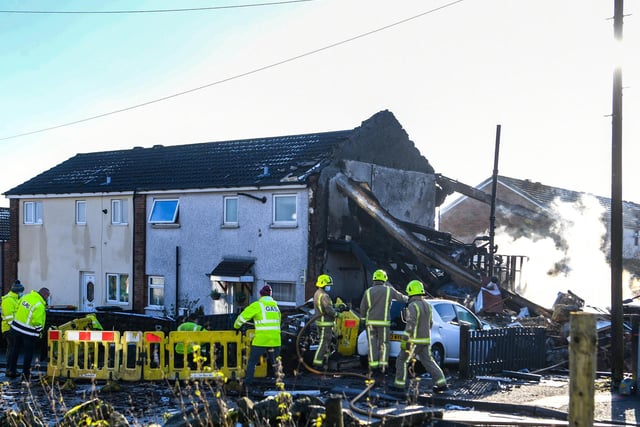 A gas main was damaged and ablaze when fire crews arrived at the scene