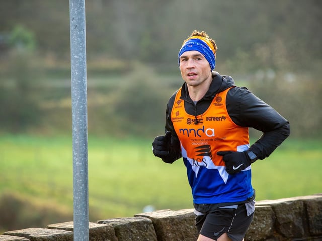 Sinfield had set an initial goal of £77,777. It passed the £500,000 mark on Saturday as he was greeted by Burrow and his family as he finished his fifth marathon.