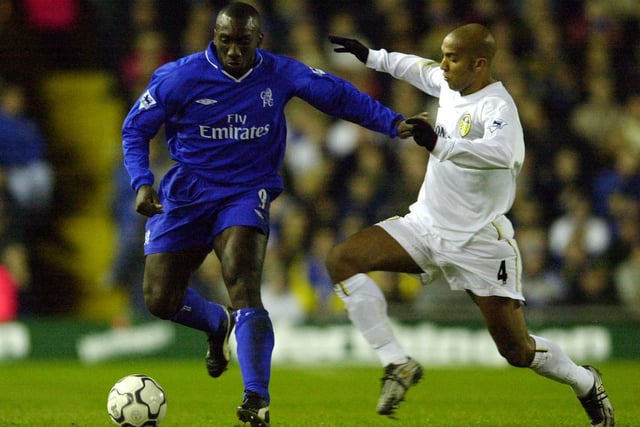 Chelsea's Jimmy Floyd Hasselbaink holds off Olivier Dacourt during the  Worthington Cup fourth round clash at Elland Road in November 2001.
