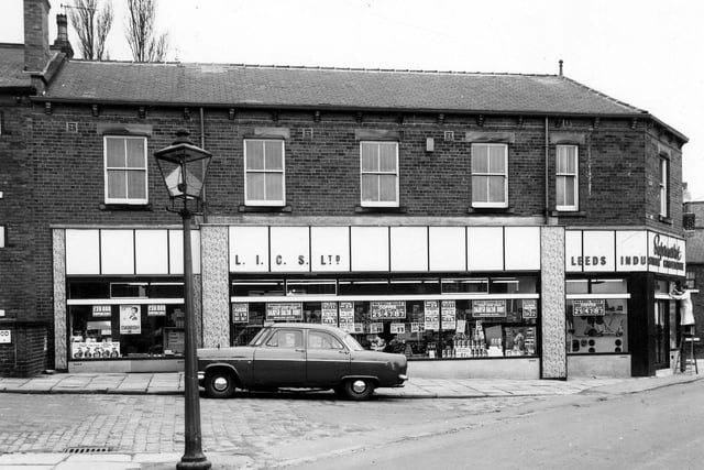 March 1966. Green Road is in the foreground of this view, then Greenwood Mount. View shows a Leeds Industrial Co-op Society Ltd Supermarket with a butchers to the front and a bakers at the back.