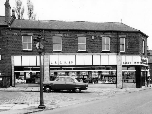 March 1966. Green Road is in the foreground of this view, then Greenwood Mount. View shows a Leeds Industrial Co-op Society Ltd Supermarket with a butchers to the front and a bakers at the back.