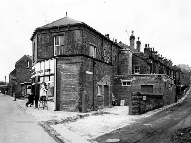 March 1966. Green Road runs from the left of the view, Cross Green Row runs to the right. In the centre is a Leeds Industrial Co-op Society Ltd.