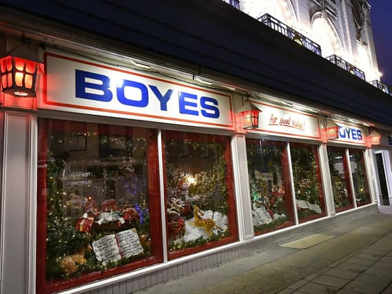This years window display shines brightly in the dark.