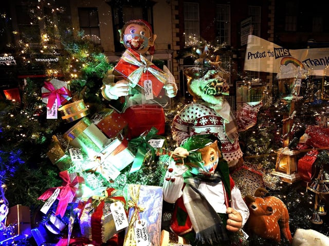 The presents are stacked high in the window this year!