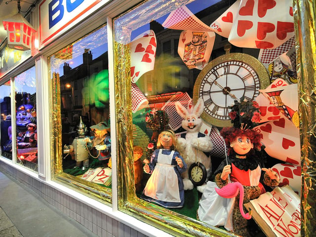 Characters from Alice in Wonderland and The Wizard of Oz featured in the window in 2016.