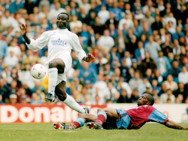 Tony Yeboah avoids the challenge of Aston Villa's Ian Taylor during the Premier League clash against Aston Villa at Elland Road in August 1995. Leeds won 2-0 thanks to goals from David White and Gary Speed.